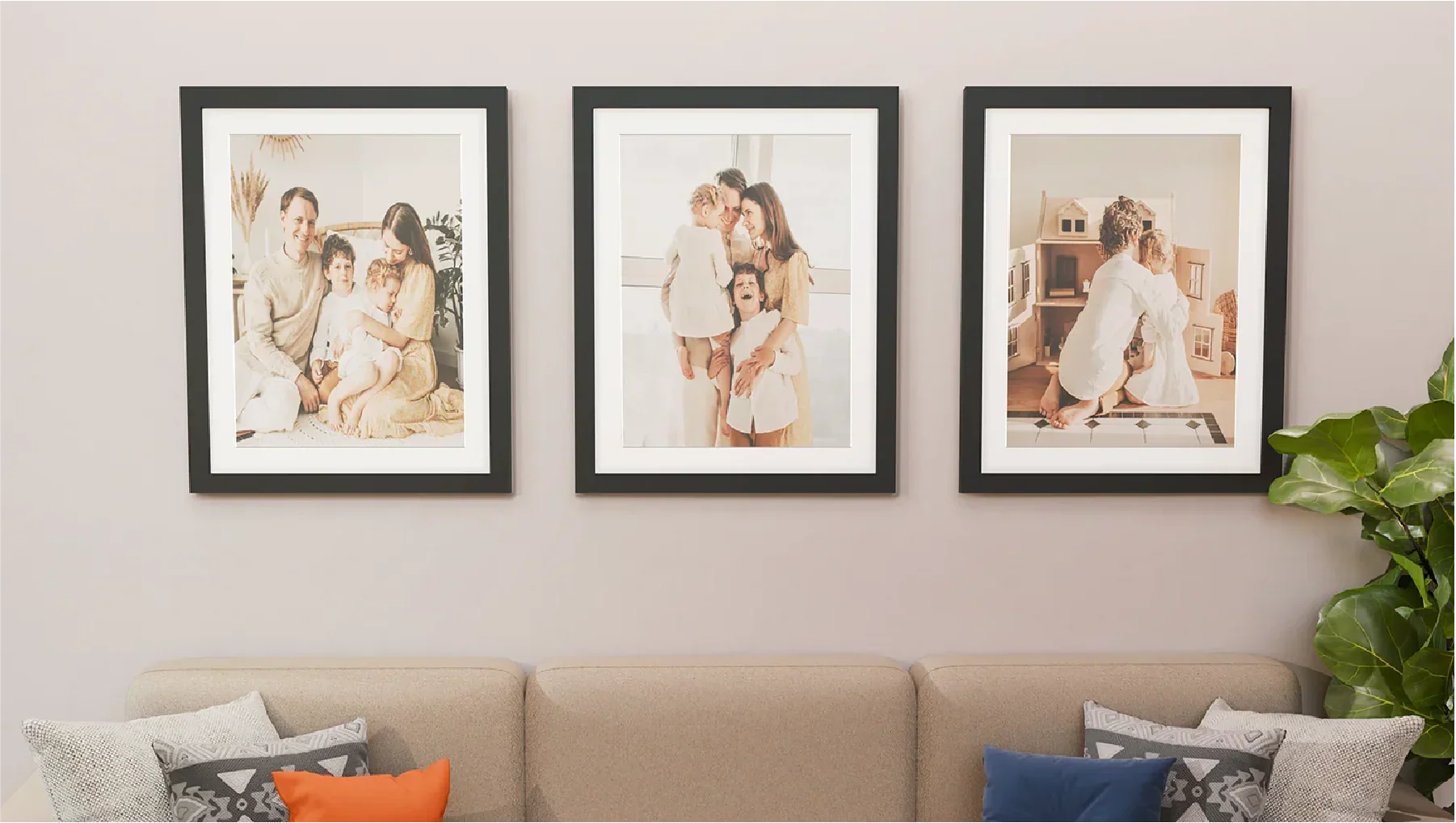 Three 22x28 picture frames featuring black solid wood borders and tempered glass covers hung up on a wall.