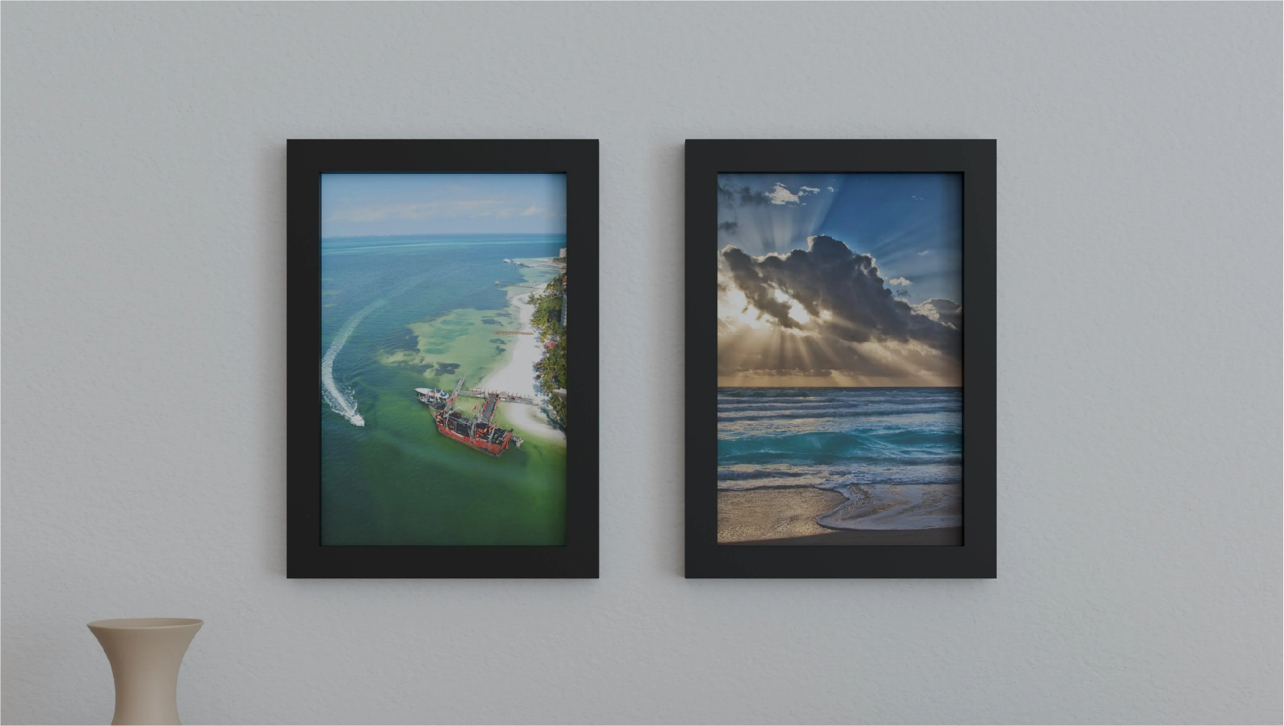 Two 12x18 solid wood picture frames with tempered glass hung up on a wall.